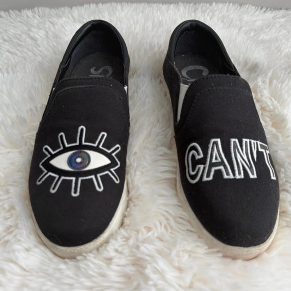 Circus by Sam Edelman Black Canvas Slip-Ons with Eye and Text